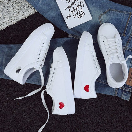 White PU leather sneakers with heart designs, women's casual breathable shoes, rubber sole, anti-slip.
