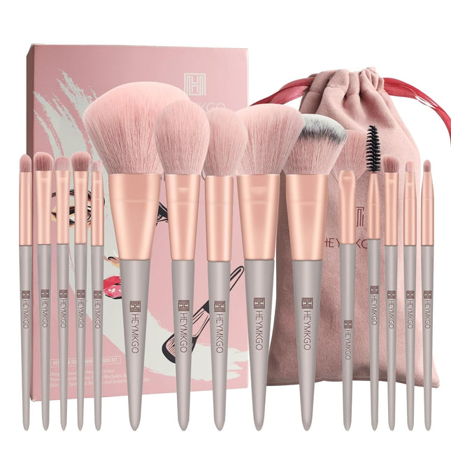 15-piece HEYMKGO makeup brush set with green tapered handles, premium synthetic bristles, and pink flannel drawstring bag.