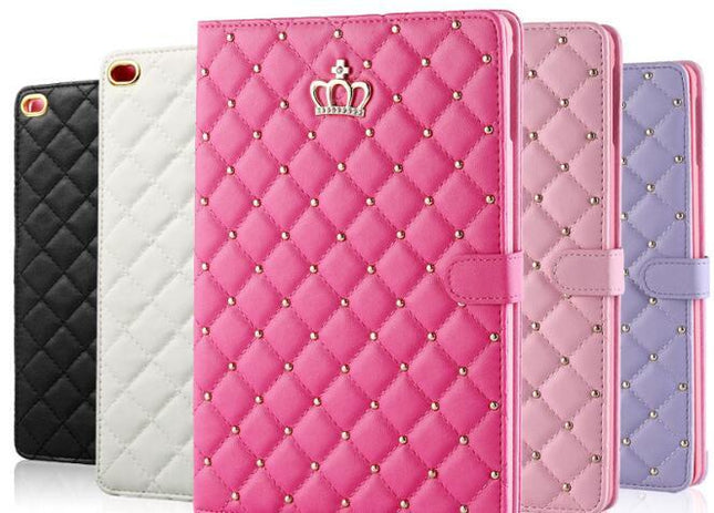 Pink PU leather Apple iPad tablet crown case cover on a table.