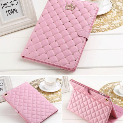 Pink PU leather Apple iPad tablet crown case cover on a table.