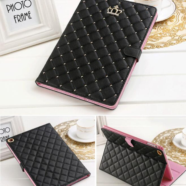 Pink PU leather Apple iPad tablet crown case cover on a table.