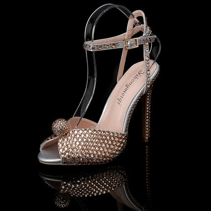 High stiletto PU women's shoes with rhinestones and ankle strap.