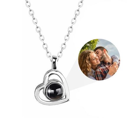 Heart-shaped necklace with personalized photo projection, "Ich liebe dich" message, perfect gift for loved ones.